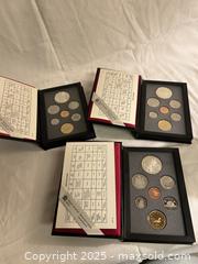 MaxSold Auction: Set of 3 Royal Canadian Mint Proof Sets  - Victoria (British Columbia, Canada) SELLER MANAGED Moving Online Auction - Toronto Street