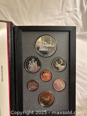 MaxSold Auction: Set of 3 Royal Canadian Mint Proof Sets  - Victoria (British Columbia, Canada) SELLER MANAGED Moving Online Auction - Toronto Street