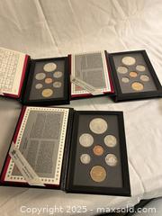 MaxSold Auction: Set of 3 Royal Canadian Mint Proof Sets  - Victoria (British Columbia, Canada) SELLER MANAGED Moving Online Auction - Toronto Street