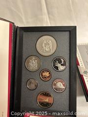 MaxSold Auction: Set of 3 Royal Canadian Mint Proof Sets  - Victoria (British Columbia, Canada) SELLER MANAGED Moving Online Auction - Toronto Street