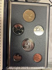 MaxSold Auction: Set of 3 Royal Canadian Mint Proof Sets  - Victoria (British Columbia, Canada) SELLER MANAGED Moving Online Auction - Toronto Street