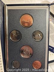 MaxSold Auction: Set of 4 Royal Canadian Mint Proof Sets  - Victoria (British Columbia, Canada) SELLER MANAGED Moving Online Auction - Toronto Street