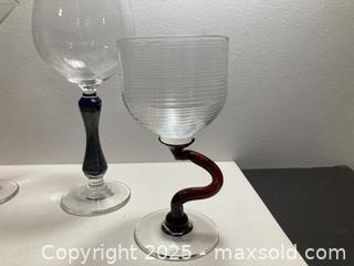 MaxSold Auction: Four Signed Art Glass Glasses - North Vancouver (British Columbia, Canada) PARTNER MANAGED Downsizing Online Auction - 14th Street West