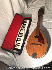 MaxSold Auction: Melodion and Vintage Mandolin - Saanich (British Columbia, Canada) SELLER MANAGED Downsizing Online Auction - Faithwood Road
