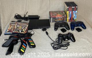 MaxSold Auction: Sony Playstation with Assorted Games &#38; Accessories - Norfolk (Ontario, Canada) SELLER MANAGED Downsizing Online Auction - Van Norman Street