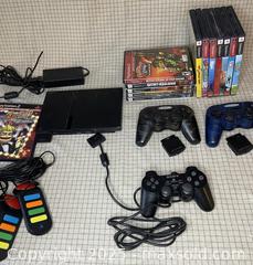 MaxSold Auction: Sony Playstation with Assorted Games &#38; Accessories - Norfolk (Ontario, Canada) SELLER MANAGED Downsizing Online Auction - Van Norman Street