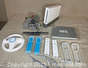 MaxSold Auction: Wii Gaming System with Assorted Games &#38; Accessories - Norfolk (Ontario, Canada) SELLER MANAGED Downsizing Online Auction - Van Norman Street