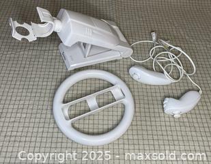 MaxSold Auction: Wii Gaming System with Assorted Games &#38; Accessories - Norfolk (Ontario, Canada) SELLER MANAGED Downsizing Online Auction - Van Norman Street