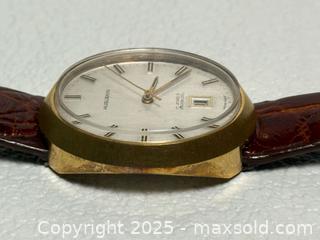 MaxSold Auction: MCM Men’s Huguenin Swiss Watch  - Toronto (Ontario, Canada) PARTNER MANAGED Estate Sale Online Auction - Dundas Street W (STORAGE)