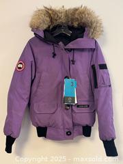 MaxSold Auction: Purple Canada Goose Down Filled Bomber Jacket with Fur Trimmed Hoodie Small Women’s  - Toronto (Ontario, Canada) PARTNER MANAGED Estate Sale Online Auction - Dundas Street W (STORAGE)
