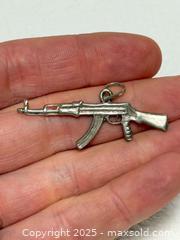 MaxSold Auction: Vintage Sterling AK-47 Pendant  - Toronto (Ontario, Canada) PARTNER MANAGED Estate Sale Online Auction - Dundas Street W (STORAGE)