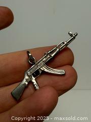 MaxSold Auction: Vintage Sterling AK-47 Pendant  - Toronto (Ontario, Canada) PARTNER MANAGED Estate Sale Online Auction - Dundas Street W (STORAGE)