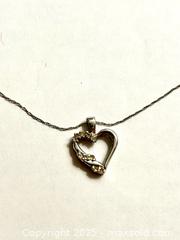 MaxSold Auction: 10K white gold necklace with heart pendant. - Mississauga (Ontario, Canada) SELLER MANAGED Downsizing Online Auction - Neris Court