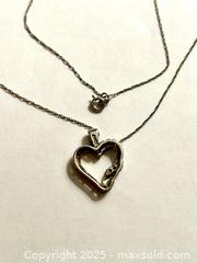 MaxSold Auction: 10K white gold necklace with heart pendant. - Mississauga (Ontario, Canada) SELLER MANAGED Downsizing Online Auction - Neris Court