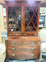 MaxSold Auction: Mahogany Veneer Two-Piece Secretary Bookcase with Glass Doors - Warwick (Rhode Island, USA) SELLER MANAGED Reseller Online Auction - Warwick Avenue