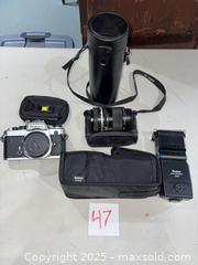 MaxSold Auction: Nikon FE 35mm SLR Camera Kit with 50mm and 80-200mm Lenses - Warwick (Rhode Island, USA) SELLER MANAGED Reseller Online Auction - Warwick Avenue