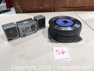 MaxSold Auction: Portable mini stereo with two speakers and 30–40 7&#34; 45 RPM records - Warwick (Rhode Island, USA) SELLER MANAGED Reseller Online Auction - Warwick Avenue