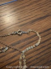 MaxSold Auction: 14k Chain and Ring  - Hamilton (Ontario, Canada) PARTNER MANAGED Estate Sale Online Auction - Parkview Drive