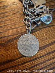 MaxSold Auction: Silver Charm Bracelet  - Hamilton (Ontario, Canada) PARTNER MANAGED Estate Sale Online Auction - Parkview Drive