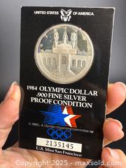 MaxSold Auction: 1984 American Silver Olympic Coin - Victoria (British Columbia, Canada) PARTNER MANAGED Estate Sale Online Auction PART 2 - Bay Street