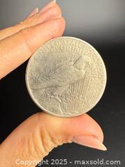 MaxSold Auction: American Silver Peace Dollar (1926) - Victoria (British Columbia, Canada) PARTNER MANAGED Estate Sale Online Auction PART 2 - Bay Street
