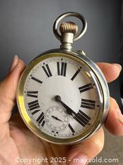 MaxSold Auction: Massive Antique Goliath Pocket Watch  - Victoria (British Columbia, Canada) PARTNER MANAGED Estate Sale Online Auction PART 2 - Bay Street