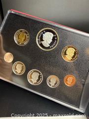 MaxSold Auction: Royal Canadian Mint Silver Dollar Book Set #1 - Victoria (British Columbia, Canada) PARTNER MANAGED Estate Sale Online Auction PART 2 - Bay Street