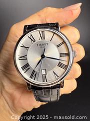 MaxSold Auction: TISSOT: Mens Stainless Steel Wristwatch  - Victoria (British Columbia, Canada) PARTNER MANAGED Estate Sale Online Auction PART 2 - Bay Street