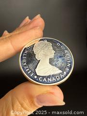 MaxSold Auction: Canadian Silver Dollar (Special Edition) #3 - Victoria (British Columbia, Canada) PARTNER MANAGED Estate Sale Online Auction PART 1 - Bay Street