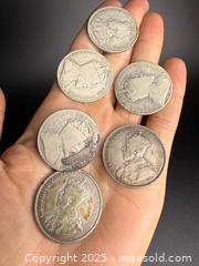 MaxSold Auction: Collection of Early Canadian Silver Half Dollars - Victoria (British Columbia, Canada) PARTNER MANAGED Estate Sale Online Auction PART 1 - Bay Street