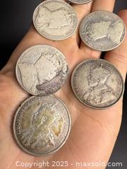 MaxSold Auction: Collection of Early Canadian Silver Half Dollars - Victoria (British Columbia, Canada) PARTNER MANAGED Estate Sale Online Auction PART 1 - Bay Street