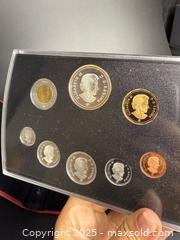 MaxSold Auction: Royal Canadian Mint Silver Dollar Book Set #1 - Victoria (British Columbia, Canada) PARTNER MANAGED Estate Sale Online Auction PART 1 - Bay Street