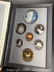 MaxSold Auction: Royal Canadian Mint Silver Dollar Book Set #2 - Victoria (British Columbia, Canada) PARTNER MANAGED Estate Sale Online Auction PART 1 - Bay Street