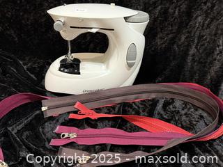 MaxSold Auction: Dressmaker Compact Sewing Machine with Zipper Materials - New Westminster (British Columbia, Canada) SELLER MANAGED Reseller Online Auction - Columbia Street