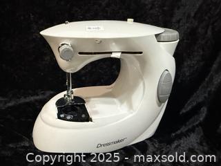 MaxSold Auction: Dressmaker Compact Sewing Machine with Zipper Materials - New Westminster (British Columbia, Canada) SELLER MANAGED Reseller Online Auction - Columbia Street