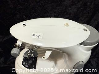 MaxSold Auction: Dressmaker Compact Sewing Machine with Zipper Materials - New Westminster (British Columbia, Canada) SELLER MANAGED Reseller Online Auction - Columbia Street