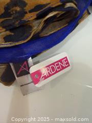 MaxSold Auction: Large Collection of Women's Fashion Scarves and Wraps - New Westminster (British Columbia, Canada) SELLER MANAGED Reseller Online Auction - Columbia Street