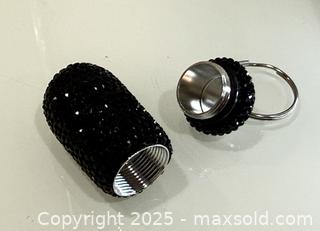 MaxSold Auction:  New in package Black Rhinestone Pill Capsule Keychain with Hidden Compartment - New Westminster (British Columbia, Canada) SELLER MANAGED Reseller Online Auction - Columbia Street