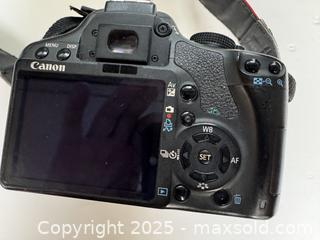 MaxSold Auction: mint condition Canon Rebel T1i/500 D SLR camera plus two lenses  - Mississauga (Ontario, Canada) SELLER MANAGED Downsizing Online Auction - Summerville Court (STORAGE)