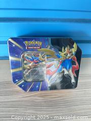 MaxSold Auction: Pokemon Tin Sealed C  - Vancouver (British Columbia, Canada) SELLER MANAGED Estate Sale Online Auction - East 7th Avenue