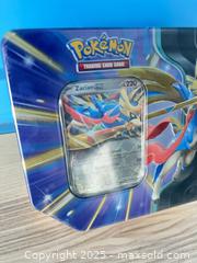 MaxSold Auction: Pokemon Tin Sealed C  - Vancouver (British Columbia, Canada) SELLER MANAGED Estate Sale Online Auction - East 7th Avenue