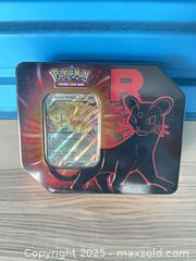 MaxSold Auction: Team Rocket Pokemon Tin C  - Vancouver (British Columbia, Canada) SELLER MANAGED Estate Sale Online Auction - East 7th Avenue