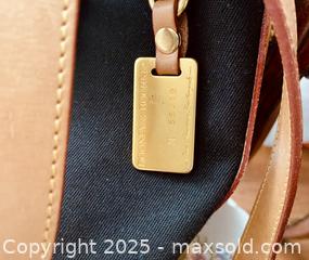 MaxSold Auction: Dooney &#38; Bourke Cabriolet Bucket Bag In Black Canvas With Tan Leather Trim - Toronto (Ontario, Canada) SELLER MANAGED Estate Sale Online Auction - Benary Crescent