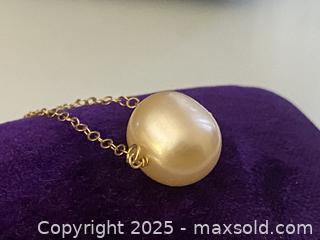 MaxSold Auction: Very Large Genuine Pearl In Pink / Golden, Karat Gold Pendant - Toronto (Ontario, Canada) SELLER MANAGED Estate Sale Online Auction - Benary Crescent