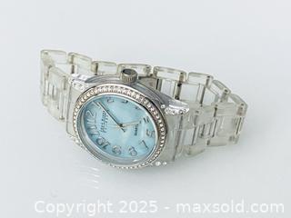 MaxSold Auction: Vintage Joan Rivers Analog Lightweight Watch With Crystal Bezel And Soft Blue Face - Toronto (Ontario, Canada) SELLER MANAGED Estate Sale Online Auction - Benary Crescent