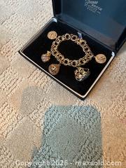 MaxSold Auction: 14K Yellow Gold Charm Bracelet with 5 Mixed-Metal Charms - Lakeshore (Ontario, Canada) PARTNER MANAGED Estate Sale Online Auction - County Road 42