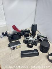 MaxSold Auction: 35mm camera lot  - Cocoa (Florida, USA) SELLER MANAGED Estate Sale Online Auction - Broadcast Court.