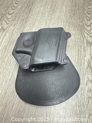 MaxSold Auction: Fobus paddle holster  - Cocoa (Florida, USA) SELLER MANAGED Estate Sale Online Auction - Broadcast Court.