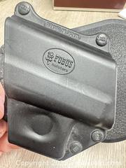 MaxSold Auction: Fobus paddle holster  - Cocoa (Florida, USA) SELLER MANAGED Estate Sale Online Auction - Broadcast Court.