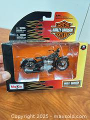 MaxSold Auction: Harley Davidson toy model motorcycle - Cocoa (Florida, USA) SELLER MANAGED Estate Sale Online Auction - Broadcast Court.